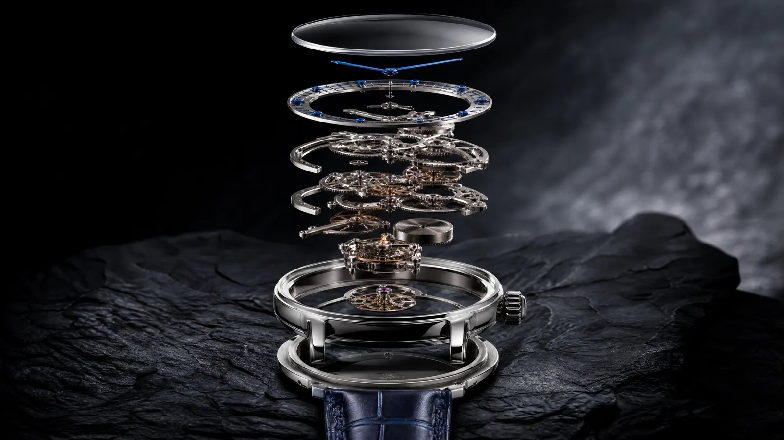 Exploded watch: sapphire crystal, hands, dial ring, gear layers, tourbillon and case floating apart